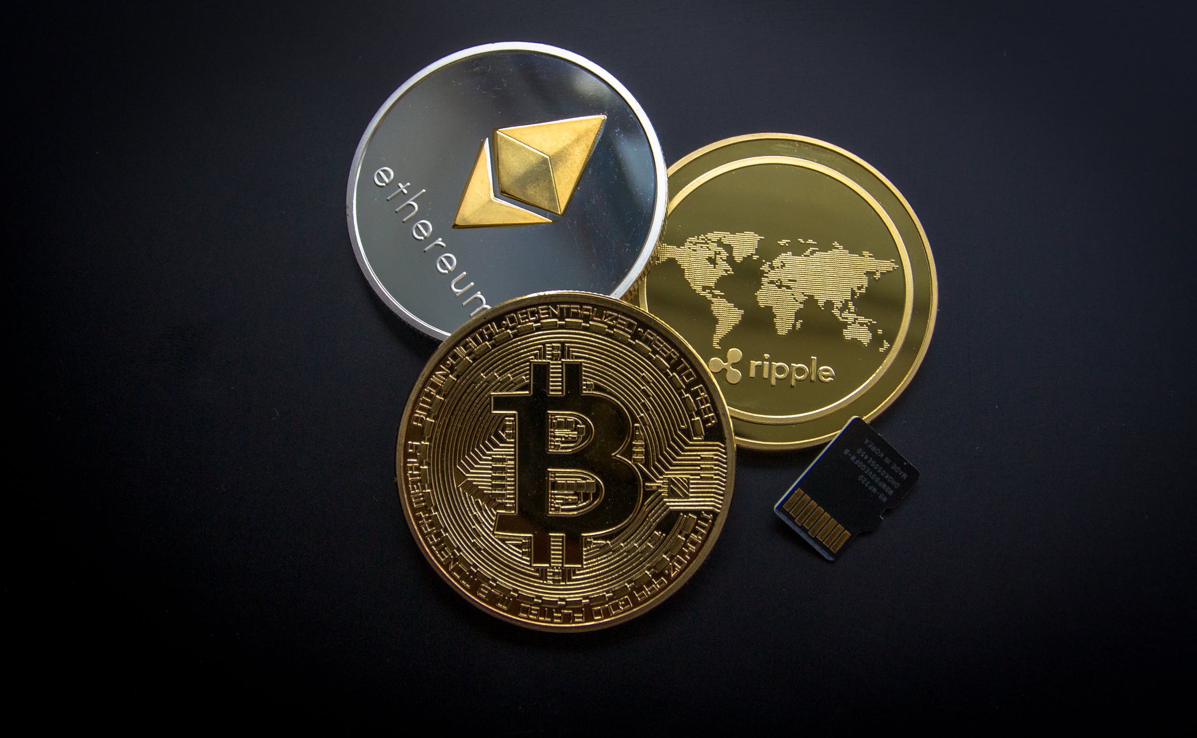 Various cryptocurrencies including Bitcoin, Ether