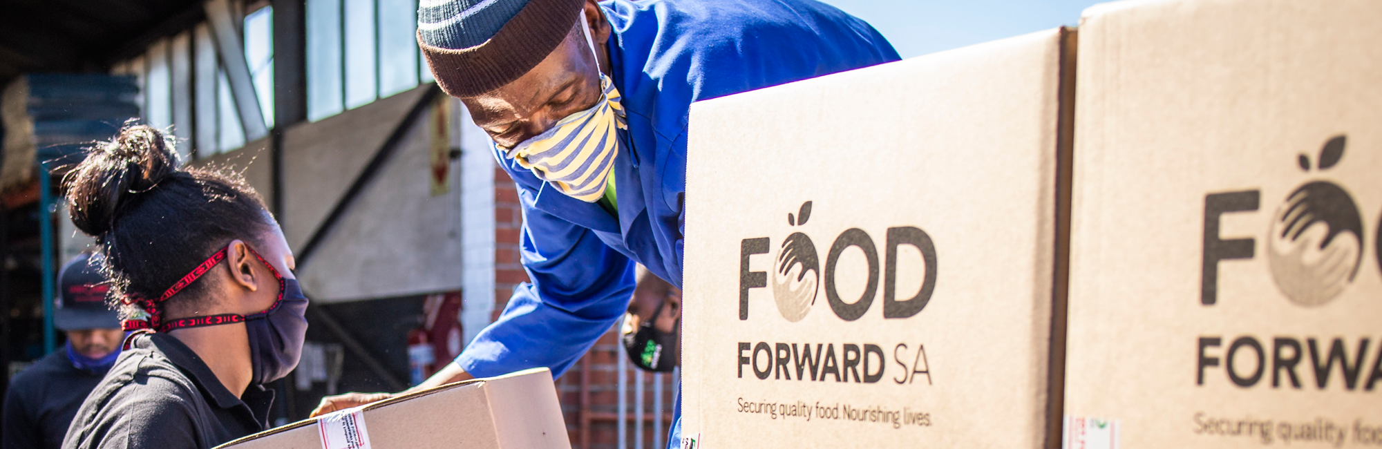 The picture depicts FoodForward SA people working on their mission