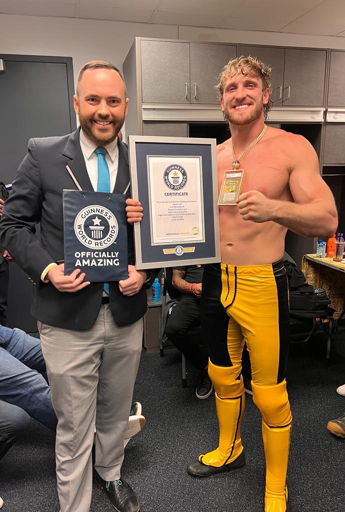 Logan Paul holding Guinness World Record for Pikachu Illustrator Pokemon card